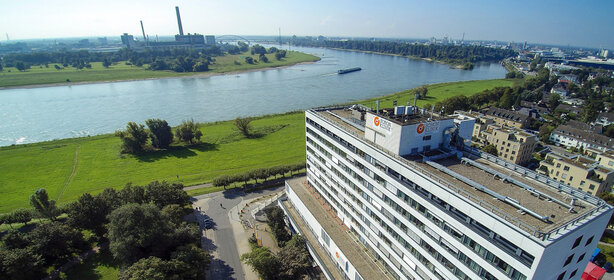 Aerial view of the Schoen Clinic Düsseldorf on the Rhine, showing the clinic building and surrounding area