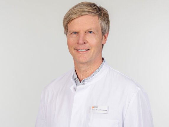 Dr Michael Poschmann